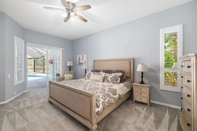 bedroom with access to outside, light colored carpet, and ceiling fan