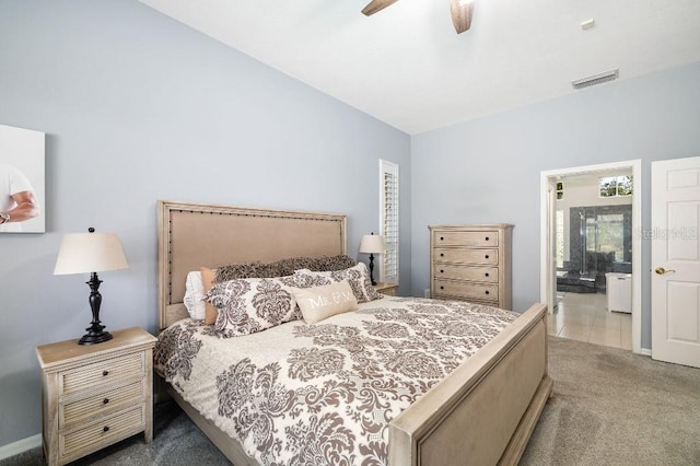 bedroom with connected bathroom, carpet floors, and ceiling fan