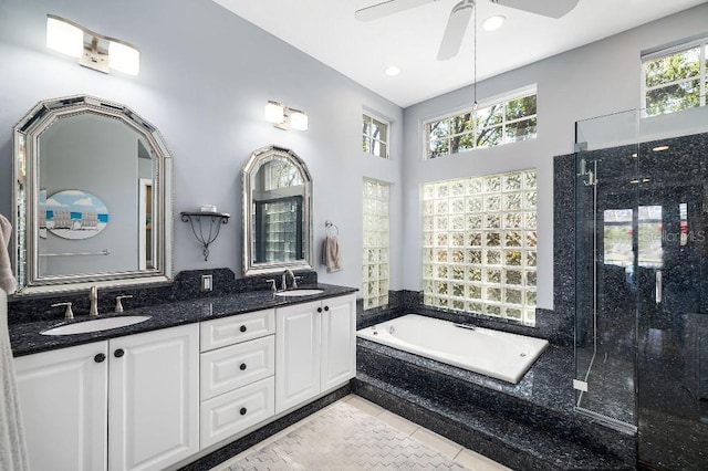 bathroom featuring ceiling fan, vanity, separate shower and tub, and tile patterned flooring