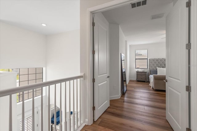 hallway featuring dark wood-type flooring