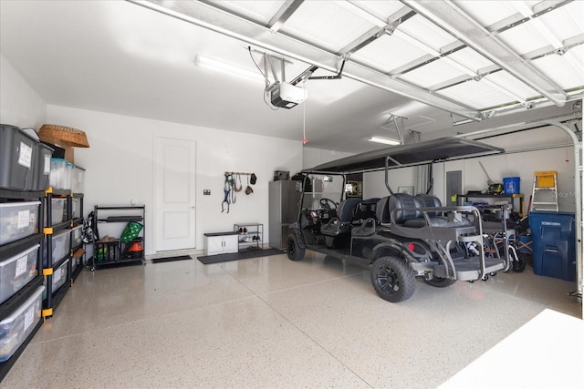 garage featuring a garage door opener