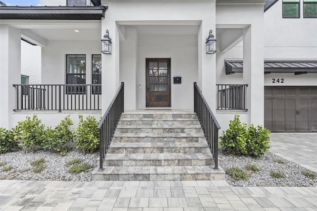 property entrance with a garage