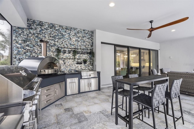 view of patio featuring an outdoor kitchen