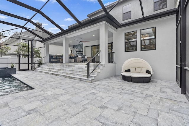 view of patio with ceiling fan and an outdoor hangout area