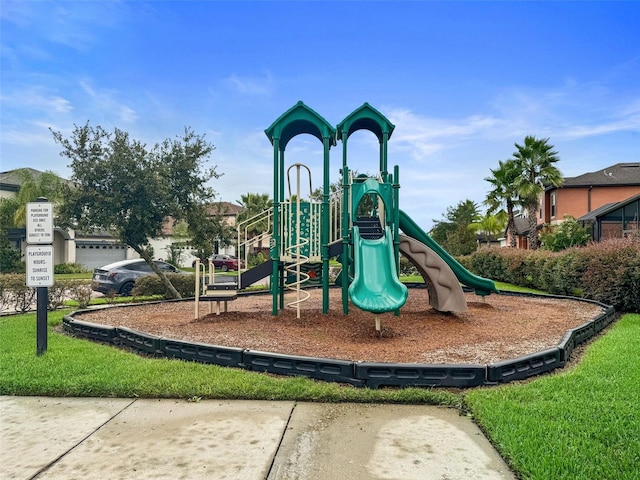 view of playground with a yard