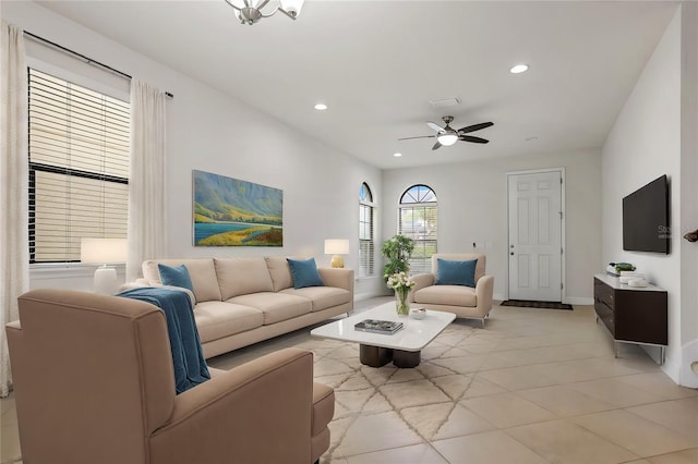 living room featuring ceiling fan