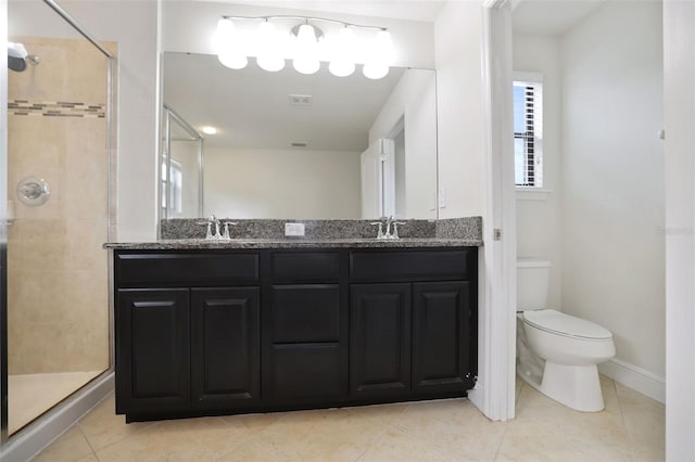 bathroom with walk in shower, vanity, toilet, and tile patterned flooring