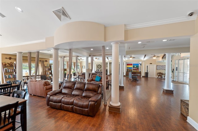 living room featuring decorative columns and ceiling fan