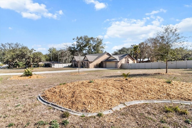 view of yard featuring a garage