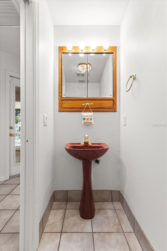 bathroom featuring tile patterned flooring