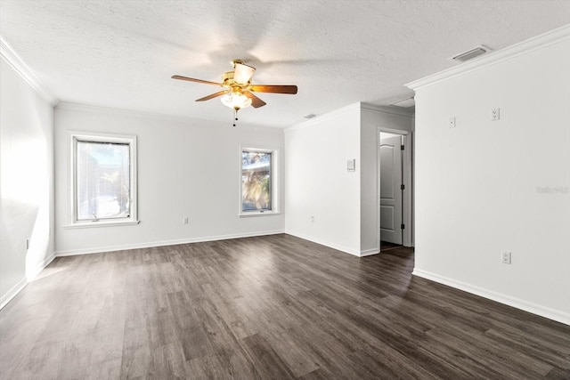 empty room featuring dark wood-type flooring, a textured ceiling, and ceiling fan