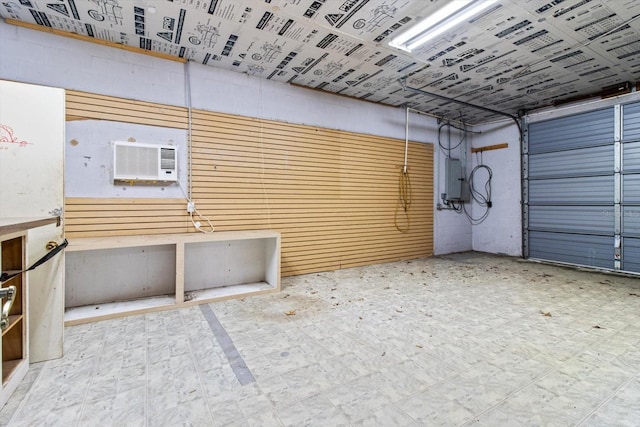 garage with a wall mounted air conditioner