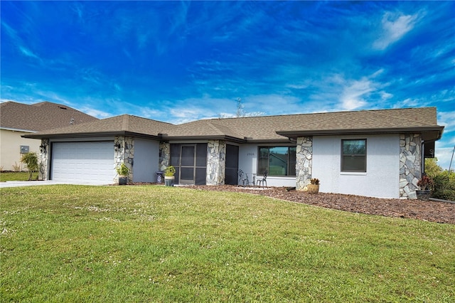 single story home featuring a garage and a front lawn