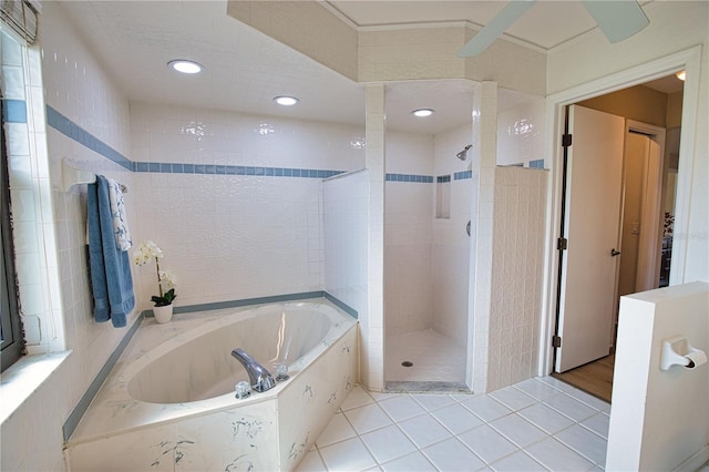 bathroom with plus walk in shower and tile patterned flooring