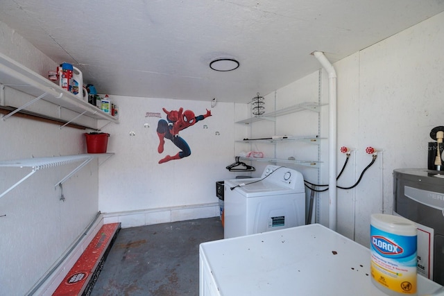 washroom with washer / dryer