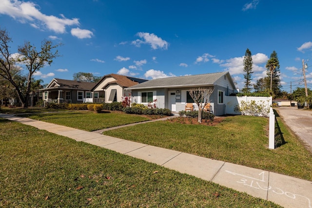 ranch-style house with a front yard