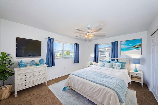 bedroom featuring ceiling fan and dark colored carpet