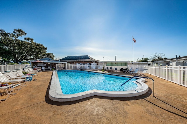 view of pool featuring a patio