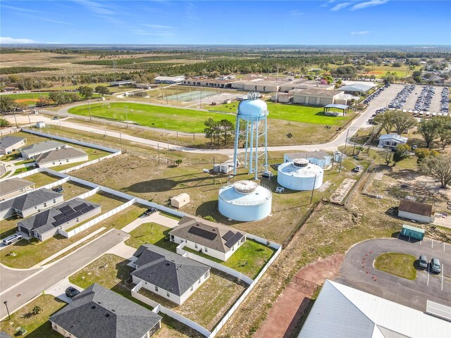 birds eye view of property with a residential view