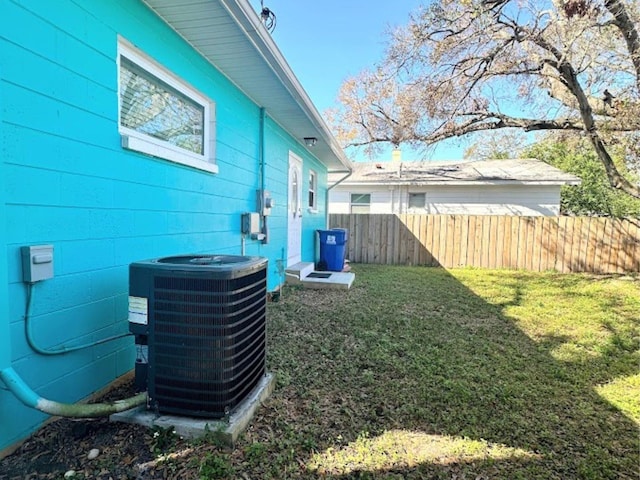 view of yard with central AC