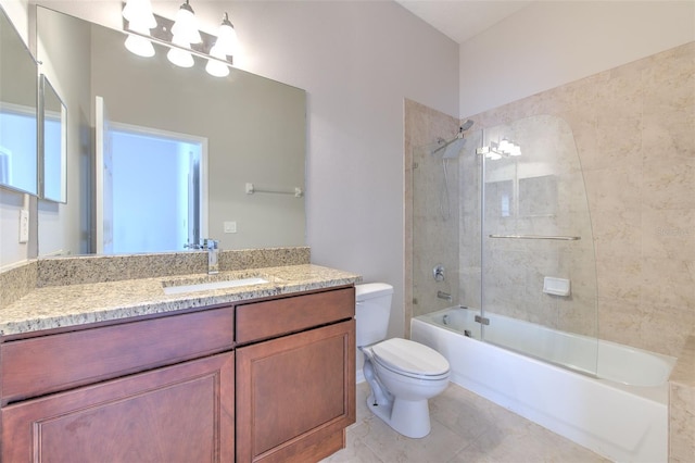 full bathroom with vanity, tile patterned flooring, shower / bath combination with glass door, and toilet