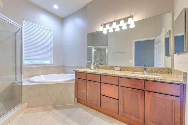 bathroom with vanity, separate shower and tub, and tile patterned flooring