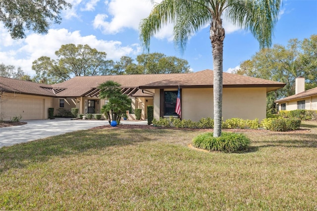 ranch-style house with a garage and a front yard