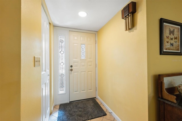 entrance foyer featuring light tile patterned floors