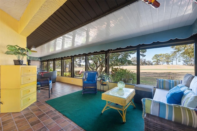 sunroom with wooden ceiling