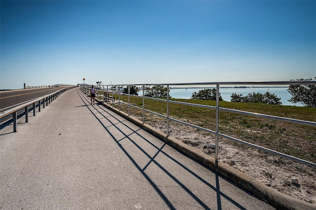 view of home's community with a water view