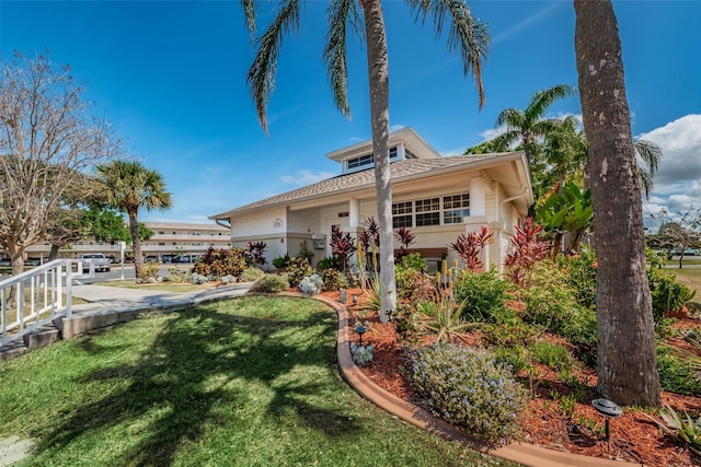 view of front of home with a front yard