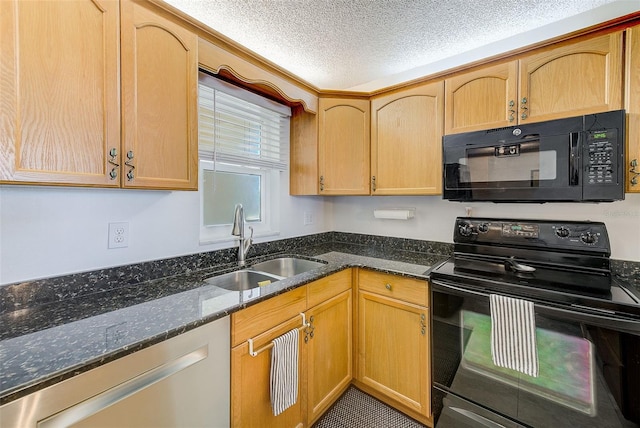 kitchen featuring sink, dark stone countertops, black appliances, a textured ceiling, and light brown cabinetry