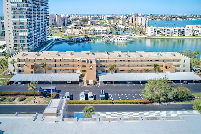 birds eye view of property featuring a water view