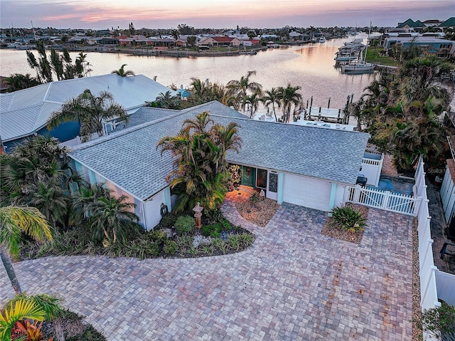 drone / aerial view with a water view