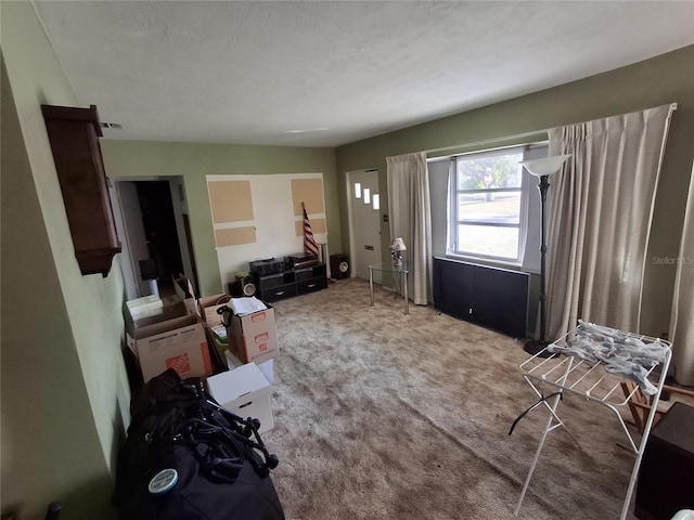 interior space featuring a textured ceiling