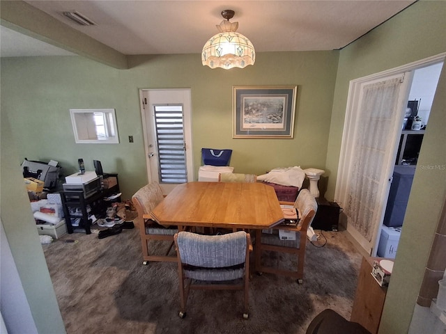 view of carpeted dining room