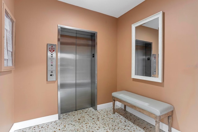 1200 N Shore Dr NE Unit 204, Saint Petersburg, FL 33701 - interior space with baseboards, elevator, electric panel, and light speckled floor