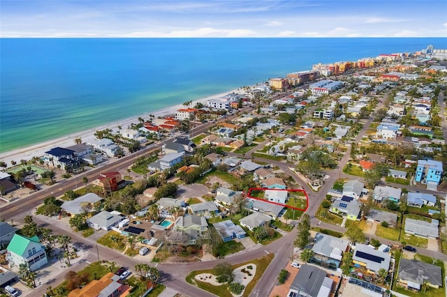 aerial view featuring a water view and a beach view