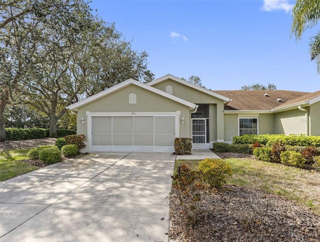 ranch-style home featuring a garage