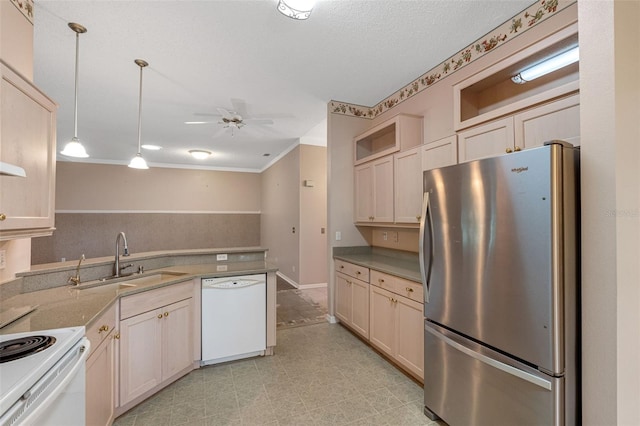 kitchen featuring sink, crown molding, white appliances, decorative light fixtures, and ceiling fan