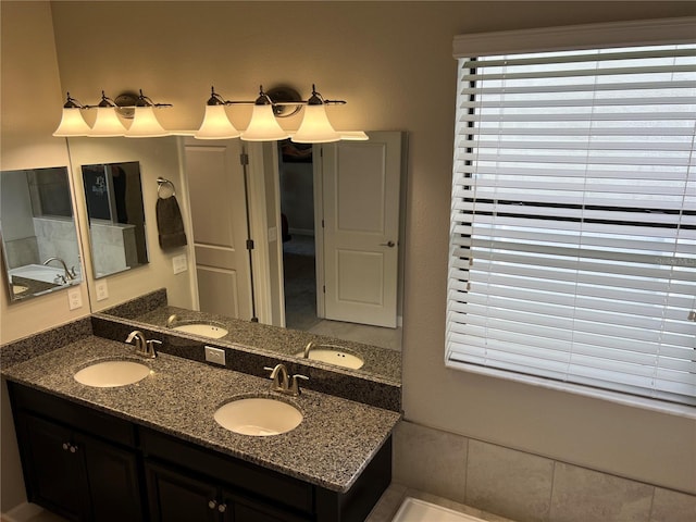 bathroom featuring double vanity and a sink