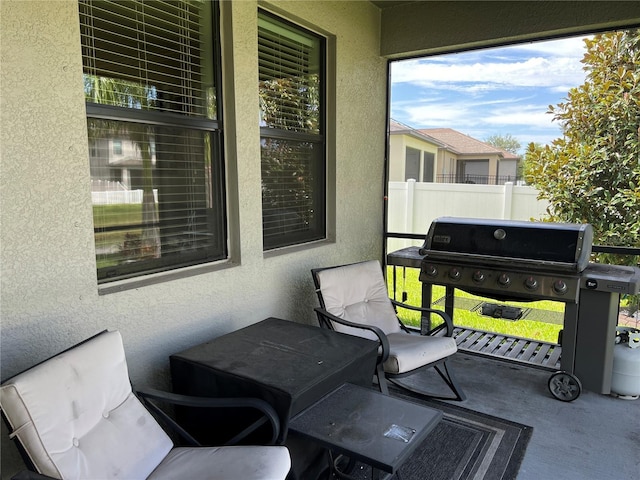 exterior space with a grill