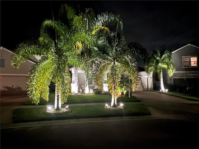 view of front of home featuring concrete driveway