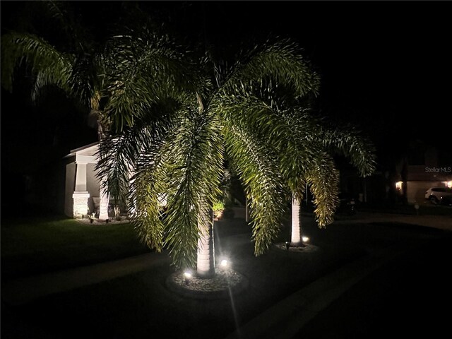 view of yard at twilight