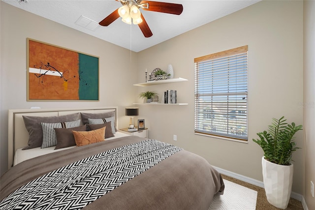 carpeted bedroom featuring ceiling fan