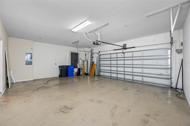 garage featuring a garage door opener and electric panel