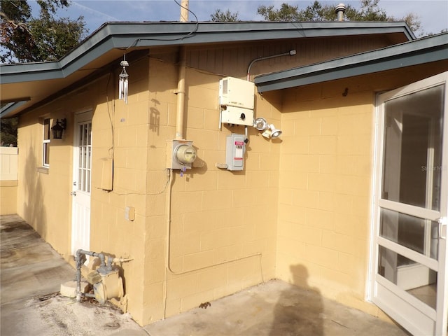 view of property exterior featuring a patio area