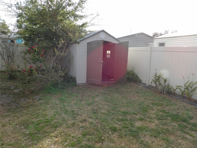 view of outdoor structure featuring a yard