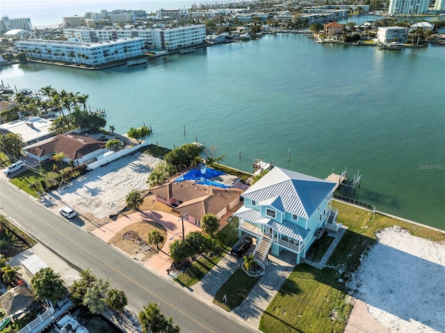 drone / aerial view with a water view