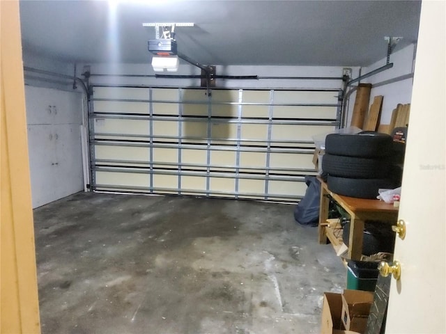 garage featuring a garage door opener